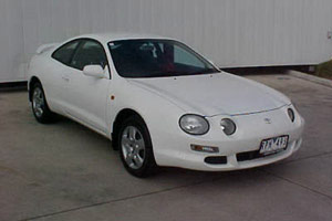 A white 1998 Toyota Celica SX–R, if you want to be specific